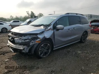 2023 Honda Odyssey with VIN 5KBRL6886PB800665, listed as a Copart auction lot 59568795 with 10,696 mi miles and Salvage title. Bid and sale history available at DreamBid. Image 1.