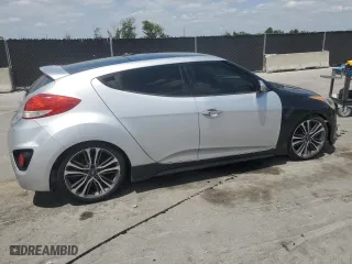 2014 Hyundai Veloster Turbo with VIN KMHTC6AE0EU192680, listed as a Copart auction lot 54486575 with 129,949 mi miles and Clean Title. Bid and sale history available at carsss.com. Image 3.