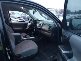 2017 Toyota Tacoma SR5 with VIN 3TMAZ5CN5HM043482, listed as a IAAI auction lot 41613811 with 114,795 mi miles and . Bid and sale history available at carsss.com. Image 5.