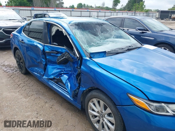 2019 Toyota Camry LE with VIN 4T1B11HK7KU259920, listed as a IAAI auction lot 42115493 with 69,254 mi miles and . Bid and sale history available at DreamBid. Image 6.