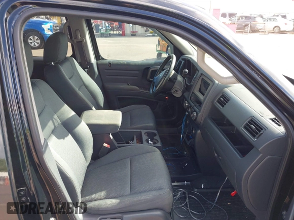 2013 Honda Ridgeline Sport with VIN 5FPYK1F70DB011814, listed as a IAAI auction lot 41689579 with 136,251 mi miles and . Bid and sale history available at DreamBid. Image 5.