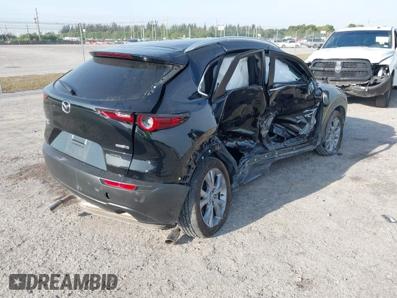 2024 Mazda CX-30 S Preferred with VIN 3MVDMBCM0RM669099, listed as a IAAI auction lot 41864473 with 6,278 mi miles and . Bid and sale history available at DreamBid. Image 4.