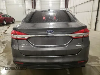 2018 Ford Fusion SE z VIN 3FA6P0HD6JR260522, wystawiony jako Copart lot #54382215 z przebiegiem 151 611 mil mil oraz Szkoda całkowita • Salvage title. Historia ofert i sprzedaży dostępna na DreamBid. Obrazek 6.