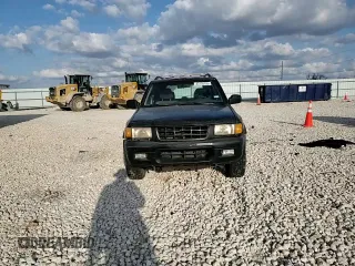 1999 Isuzu Rodeo S with VIN 4S2CK58W3X4362974, listed as a Copart auction lot 43155155 with 396,448 mi miles and Salvage Title. Bid and sale history available at DreamBid. Image 11.