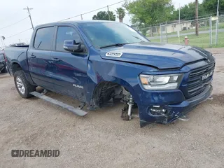 2024 Ram 1500 Laramie with VIN 1C6SRFJTXRN119479, listed as a IAAI auction lot 42272339 with 21,973 mi miles and . Bid and sale history available at DreamBid. Image 1.