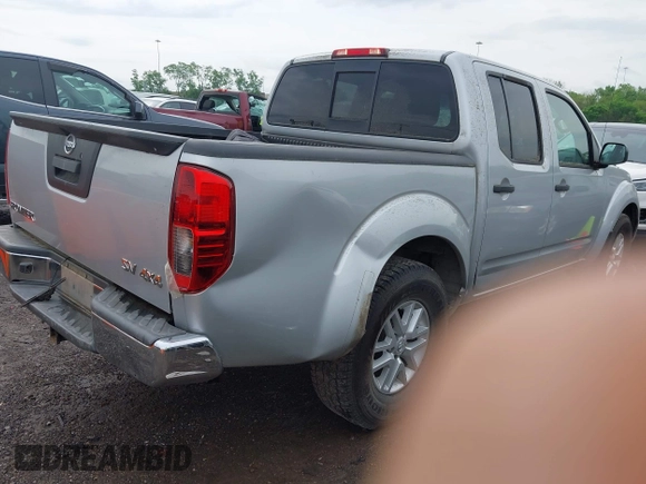 2017 Nissan Frontier SV with VIN 1N6AD0EV2HN750721, listed as a IAAI auction lot 42102310 with 79,205 mi miles and . Bid and sale history available at DreamBid. Image 4.