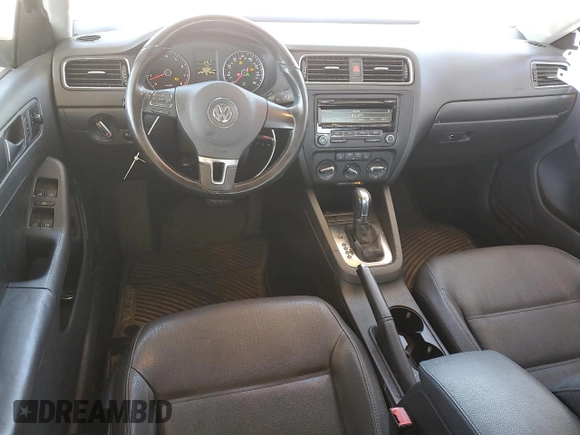 2012 Volkswagen Jetta SE with VIN 3VWDX7AJ2CM340682, listed as a Copart auction lot 57864945 with 180,680 mi miles and Salvage title. Bid and sale history available at DreamBid. Image 8.