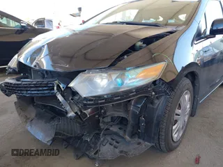 2010 Honda Insight LX with VIN JHMZE2H54AS021815, listed as a IAAI auction lot 42259951 with 137,436 mi miles and . Bid and sale history available at DreamBid. Image 14.