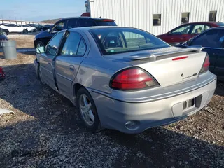 2000 Pontiac Grand Am GT1 with VIN 1G2NV52E6YC553053, listed as a IAAI auction lot 41070259 with 206,629 mi miles. Bid and sale history available at carsss.com. Image 3.