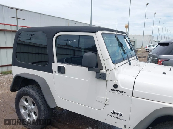 2003 Jeep Wrangler Sport with VIN 1J4FA49S43P362339, listed as a IAAI auction lot 41452901 with 208,128 mi miles and . Bid and sale history available at DreamBid. Image 14.