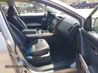 2014 Mazda CX-9 Grand Touring z VIN JM3TB3DV4E0429428, wystawiony jako IAAI lot #42094028 z przebiegiem 147 294 mil mil oraz . Historia ofert i sprzedaży dostępna na DreamBid. Obrazek 5.