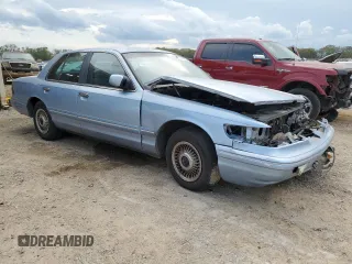 1997 Mercury Grand Marquis GS z VIN 2MELM74W2VX642879, wystawiony jako Copart lot #51464035 z przebiegiem 117 860 mil mil oraz Szkoda całkowita • Salvage title. Historia ofert i sprzedaży dostępna na DreamBid. Obrazek 4.