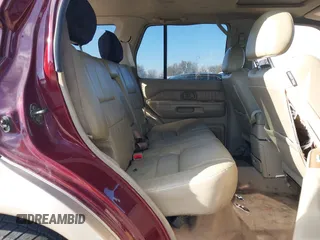 2002 Infiniti QX4 with VIN JNRDR09X02W212520, listed as a IAAI auction lot 41381529 with 182,828 mi miles and . Bid and sale history available at DreamBid. Image 8.