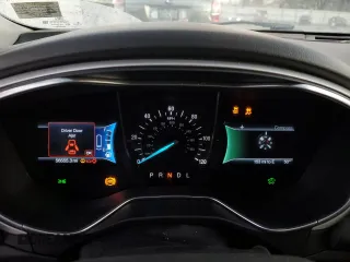 2016 Ford Fusion SE Hybrid with VIN 3FA6P0LU5GR127038, listed as a Copart auction lot 79508174 with 56,555 mi miles and Salvage Title. Bid and sale history available at carsss.com. Image 9.