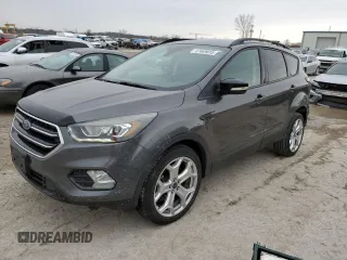 2017 Ford Escape Titanium with VIN 1FMCU9J99HUB79870, listed as a Copart auction lot 47469655 with 58,683 mi miles and Salvage Title. Bid and sale history available at carsss.com. Image 1.