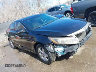 2015 Kia Optima LX with VIN KNAGM4A71F5652818, listed as a IAAI auction lot 41656933 with 251,967 mi miles. Bid and sale history available at carsss.com. Image 1.