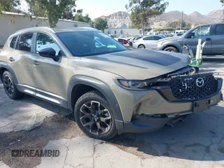 2023 Mazda CX-50 2.5 Turbo with VIN 7MMVABXY5PN120917, listed as a IAAI auction lot 42431995 with 34,421 mi miles and . Bid and sale history available at DreamBid. Image 1.