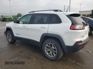 2021 Jeep Cherokee Trailhawk with VIN 1C4PJMBX7MD209604, listed as a Copart auction lot 59289355 with 44,627 mi miles and Salvage title. Bid and sale history available at DreamBid. Image 2.