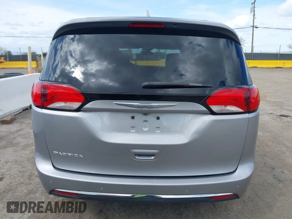 2017 Chrysler Pacifica Touring L with VIN 2C4RC1BG1HR803027, listed as a IAAI auction lot 41896775 with 112,896 mi miles and . Bid and sale history available at DreamBid. Image 16.