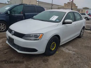 2014 Volkswagen Jetta SE with VIN 3VWD07AJ8EM296808, listed as a IAAI auction lot 41894682 with 193,898 mi miles and . Bid and sale history available at DreamBid. Image 2.