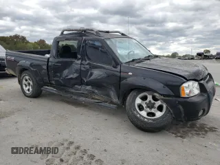 2004 Nissan Frontier SC with VIN 1N6MD29Y44C437656, listed as a Copart auction lot 71741124 with 272,881 mi miles and Salvage title. Bid and sale history available at DreamBid. Image 4.