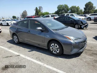 2018 Toyota Prius Two z VIN JTDKBRFU2J3058774, wystawiony jako Copart lot #58352045 z przebiegiem 109 711 mil mil oraz Szkoda całkowita • Salvage title. Historia ofert i sprzedaży dostępna na DreamBid. Obrazek 4.