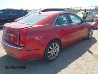 2008 Cadillac CTS RWD w/1SB with VIN 1G6DV57V980213836, listed as a IAAI auction lot 42006005 with 124,596 mi miles. Bid and sale history available at carsss.com. Image 4.