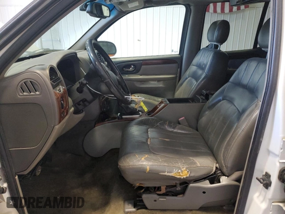 2003 GMC Envoy SLT with VIN 1GKES16S436240107, listed as a Copart auction lot 52327005 with 237,745 mi miles and Clean Title. Bid and sale history available at carsss.com. Image 7.