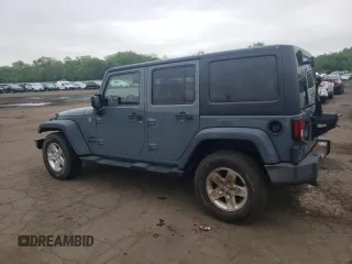 2015 Jeep Wrangler Unlimited Sport with VIN 1C4BJWDGXFL551284, listed as a Copart auction lot 56905935 with 155,988 mi miles and Salvage title. Bid and sale history available at DreamBid. Image 2.