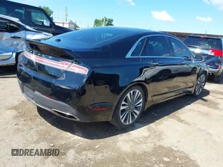 2017 Lincoln MKZ Reserve z VIN 3LN6L5E97HR650179, wystawiony jako IAAI lot #42366592 z przebiegiem 98 224 mil mil oraz . Historia ofert i sprzedaży dostępna na DreamBid. Obrazek 4.