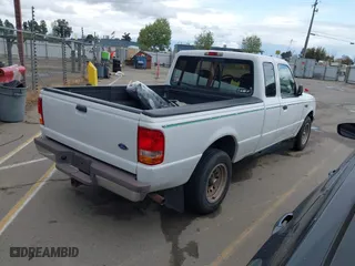 1997 Ford Ranger Splash with VIN 1FTCR14U2VPB53919, listed as a IAAI auction lot 41938679 with 255,738 mi miles. Bid and sale history available at carsss.com. Image 4.