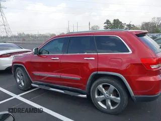 2011 Jeep Grand Cherokee Overland with VIN 1J4RS6GT4BC561169, listed as a IAAI auction lot 41847912 with 220,713 mi miles and . Bid and sale history available at DreamBid. Image 14.