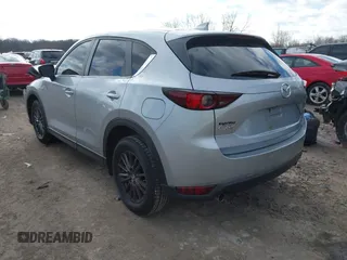 2020 Mazda CX-5 Touring with VIN JM3KFACM5L0768371, listed as a IAAI auction lot 41862623 with 138,446 mi miles and . Bid and sale history available at carsss.com. Image 3.