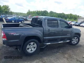 2013 Toyota Tacoma with VIN 3TMLU4EN0DM130912, listed as a IAAI auction lot 42682150 with 166,503 mi miles and . Bid and sale history available at DreamBid. Image 14.