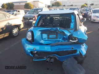 2015 MINI Hardtop 4 Door S with VIN WMWXU3C58F2B58305, listed as a IAAI auction lot 41413715 with 98,413 mi miles and . Bid and sale history available at DreamBid. Image 6.