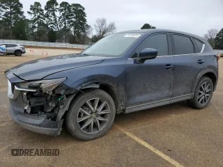 2017 Mazda CX-5 Grand Touring with VIN JM3KFADL3H0146719, listed as a Copart auction lot 44756075 with 110,891 mi miles and Salvage Title. Bid and sale history available at carsss.com. Image 1.