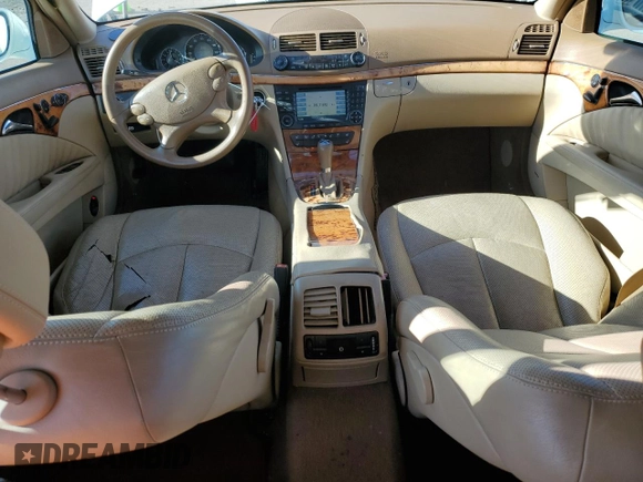 2007 Mercedes-Benz E 550 with VIN WDBUF72X37B021084, listed as a Copart auction lot 48695235 with 119,538 mi miles and Salvage Title. Bid and sale history available at DreamBid. Image 8.