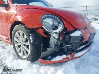 2017 Volkswagen Beetle 1.8T SE with VIN 3VWJ17AT3HM624934, listed as a IAAI auction lot 41389551 with 29,109 mi miles. Bid and sale history available at carsss.com. Image 6.