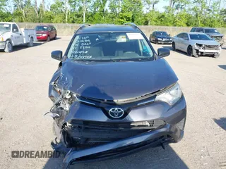 2016 Toyota RAV4 LE with VIN JTMZFREV7GJ065267, listed as a IAAI auction lot 42011267 with 180,127 mi miles. Bid and sale history available at carsss.com. Image 12.