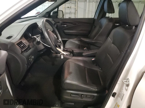 2020 Honda Passport Touring z VIN 5FNYF8H9XLB008647, wystawiony jako Copart lot #73320804 z przebiegiem 70 068 mil mil oraz Szkoda całkowita • Salvage title. Historia ofert i sprzedaży dostępna na DreamBid. Obrazek 7.