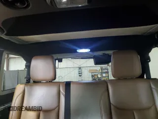 2015 Jeep Wrangler Unlimited Sahara с VIN 1C4HJWEG0FL560973, выставлен на аукционе Copart как лот 59552135 с пробегом 135 057 миль миль и Чистый • Clean title. История ставок и продаж доступна на DreamBid. Изображение 10.