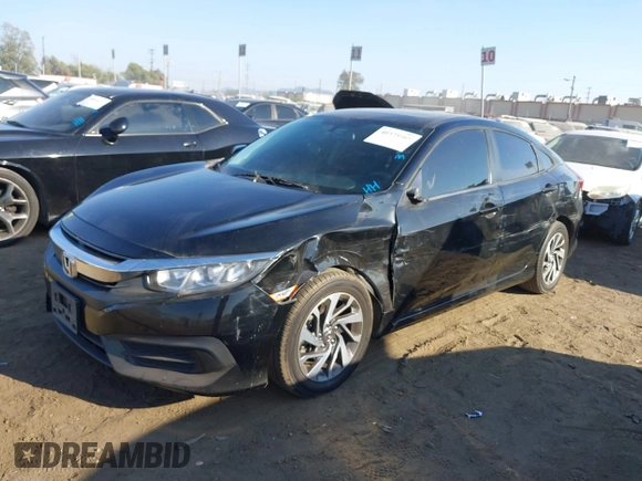 2017 Honda Civic EX z VIN 2HGFC2F75HH519233, wystawiony jako IAAI lot #40375565 z przebiegiem 133 660 mil mil oraz . Historia ofert i sprzedaży dostępna na DreamBid. Obrazek 17.