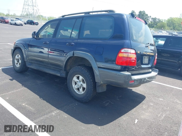 2000 Toyota Land Cruiser with VIN JT3HT05J8Y0123024, listed as a IAAI auction lot 42028792 with 360,074 mi miles. Bid and sale history available at carsss.com. Image 3.