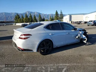 2022 Genesis G70 3.3T with VIN KMTG54TE9NU081984, listed as a Copart auction lot 79634704 with 63,169 mi miles and Salvage Title. Bid and sale history available at DreamBid. Image 3.