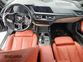 2021 BMW 2 Series 228i с VIN WBA53AK02M7H45054, выставлен на аукционе Copart как лот 60262195 с пробегом Не указан миль и На запчасти • Non repairable. История ставок и продаж доступна на DreamBid. Изображение 8.