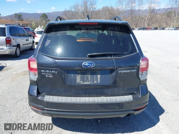 2018 Subaru Forester Premium with VIN JF2SJAGC4JH615487, listed as a IAAI auction lot 41854410 with 320,094 mi miles. Bid and sale history available at carsss.com. Image 17.