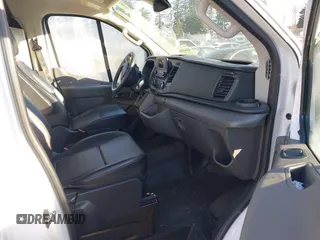 2021 Ford Transit Cargo z VIN 1FTYE1Y89MKA16809, wystawiony jako IAAI lot #41643195 z przebiegiem 7 407 mil mil oraz . Historia ofert i sprzedaży dostępna na DreamBid. Obrazek 5.