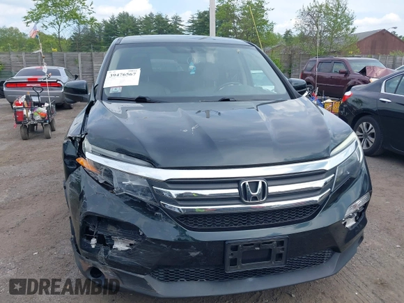 2016 Honda Pilot EX-L with VIN 5FNYF6H53GB070382, listed as a IAAI auction lot 39476567 with 83,741 mi miles and . Bid and sale history available at DreamBid. Image 12.