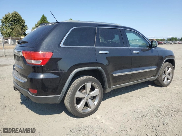 2011 Jeep Grand Cherokee Overland Summit with VIN 1J4RR6GT3BC700963, listed as a Copart auction lot 64612134 with 186,281 mi miles and Salvage Title. Bid and sale history available at carsss.com. Image 3.
