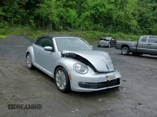 2013 Volkswagen Beetle 2.5L w/Sound/Nav z VIN 3VW5P7ATXDM812019, wystawiony jako Copart lot #56921485 z przebiegiem Nie podano mil oraz Szkoda całkowita • Salvage title. Historia ofert i sprzedaży dostępna na DreamBid. Obrazek 13.